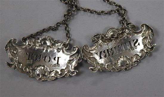 A pair of William IV silver wine labels, Port & Sherry